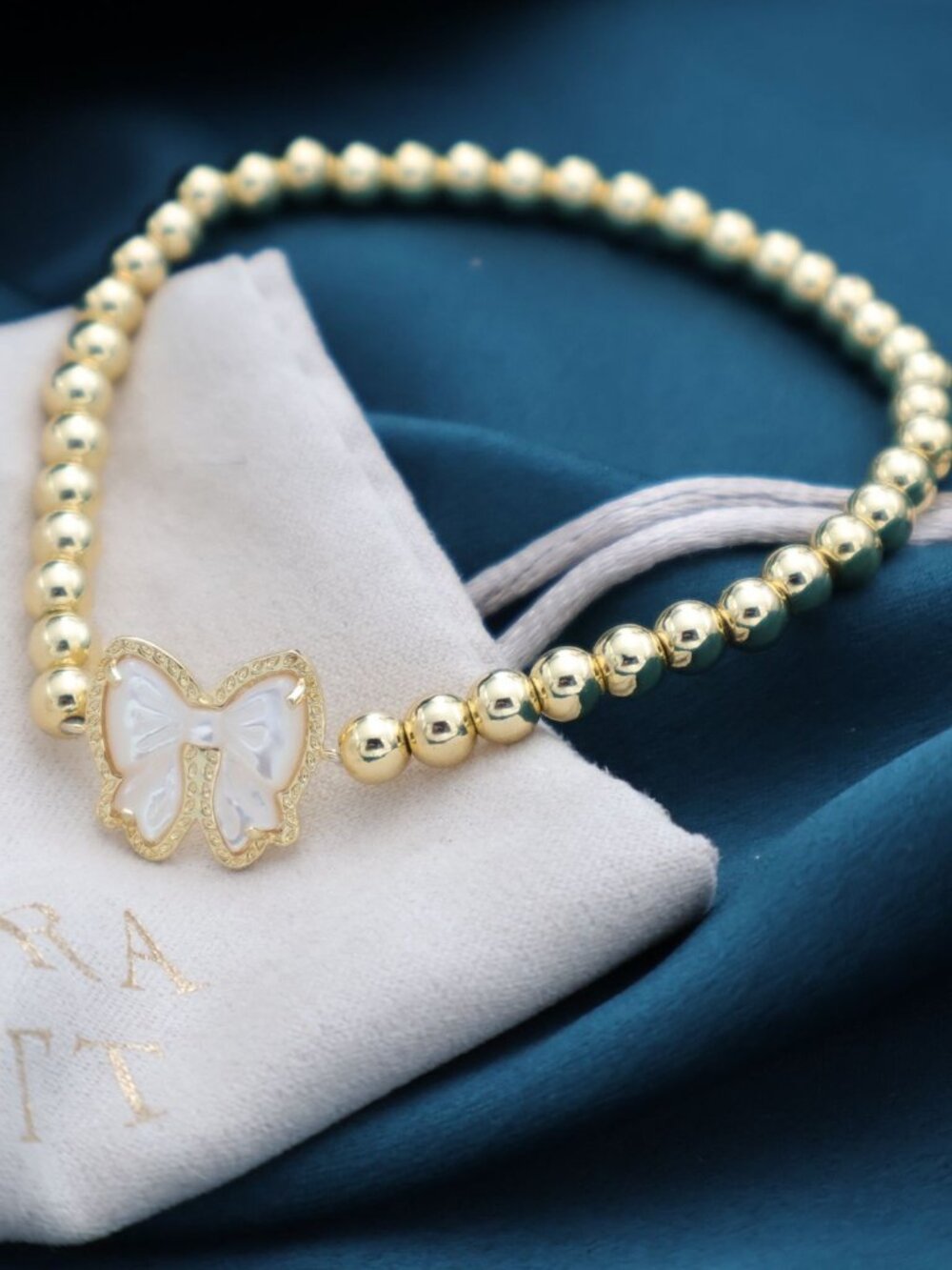 Kendra Scott Haley Bow Gold Mother--Pearl Stretch Bracelet NEW Perfect condition - Picture 2 of 2